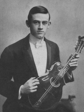 Lloyd Loar with mandolin