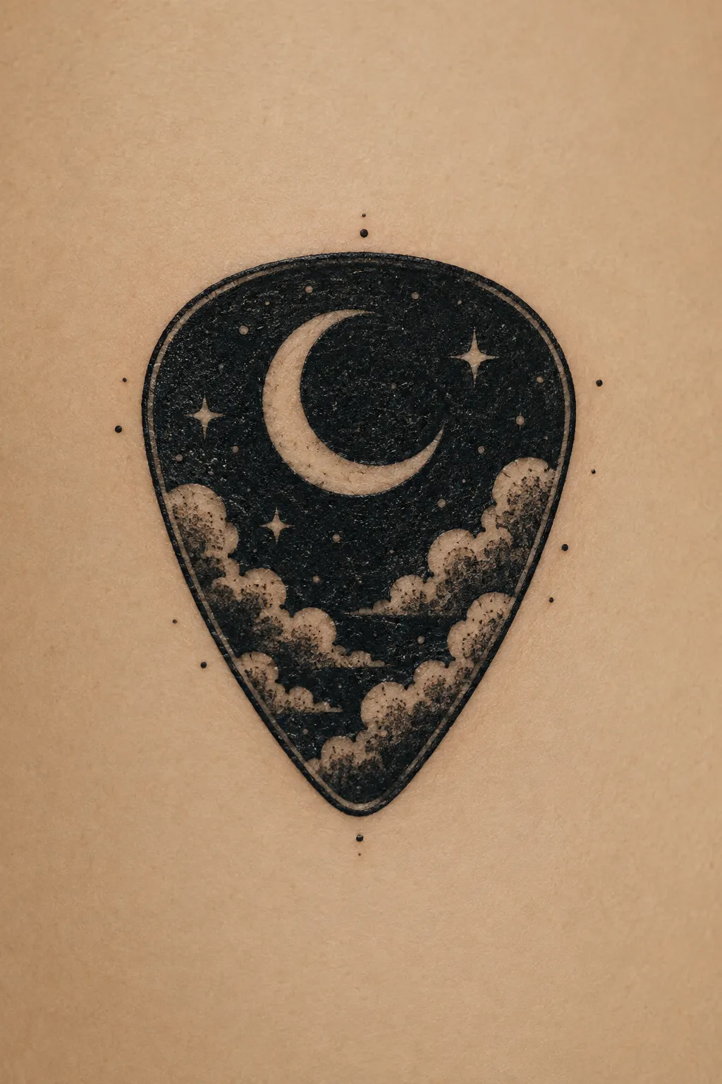 guitar pick tattoo 03