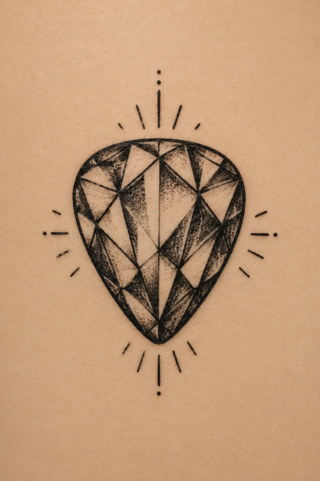guitar pick tattoo 04