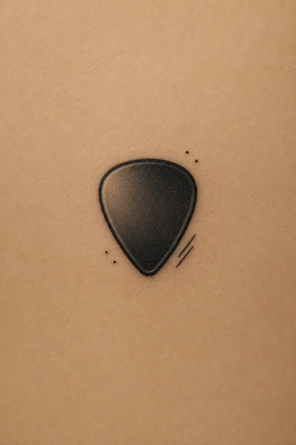 guitar pick tattoo 09
