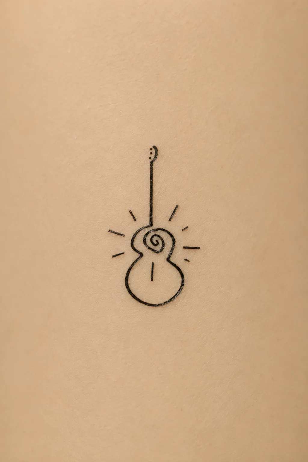 small guitar tattoo 06
